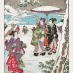 Japanese people strolling through a snowy park